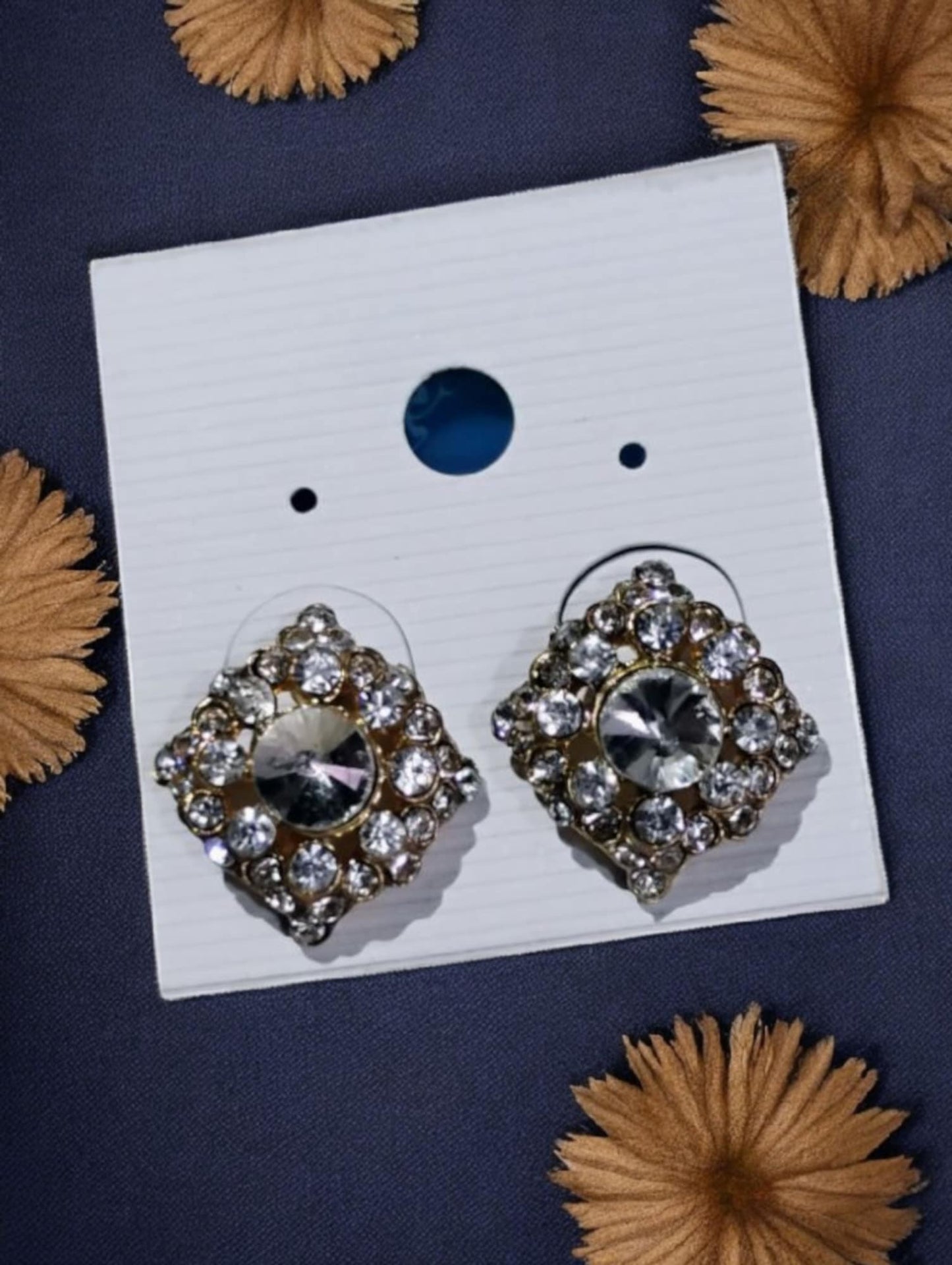 Juego par de aretes