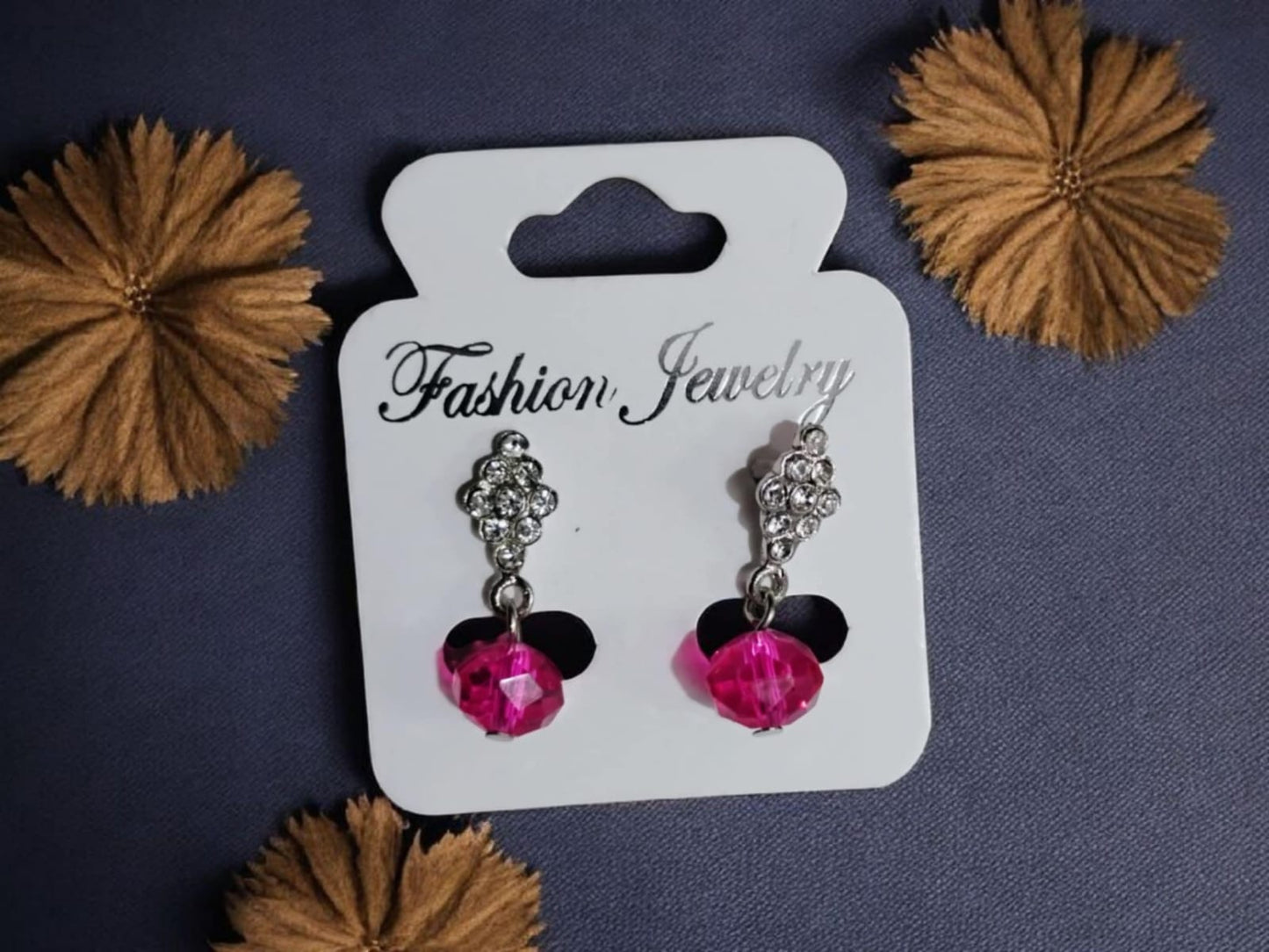 Juego par de aretes