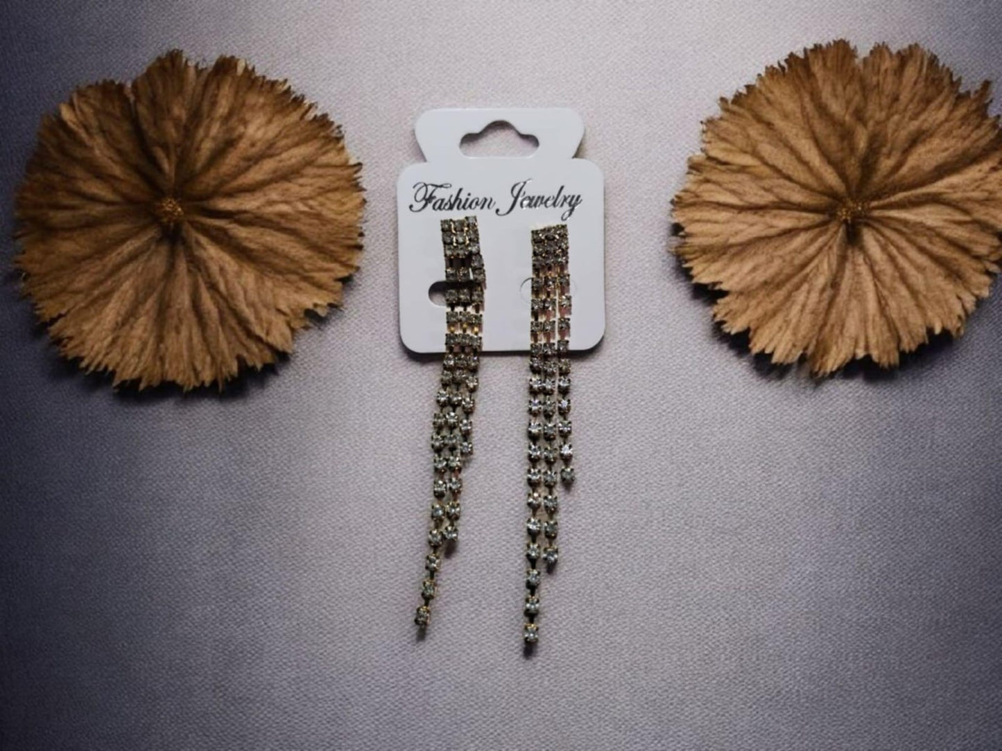 Juego par de aretes