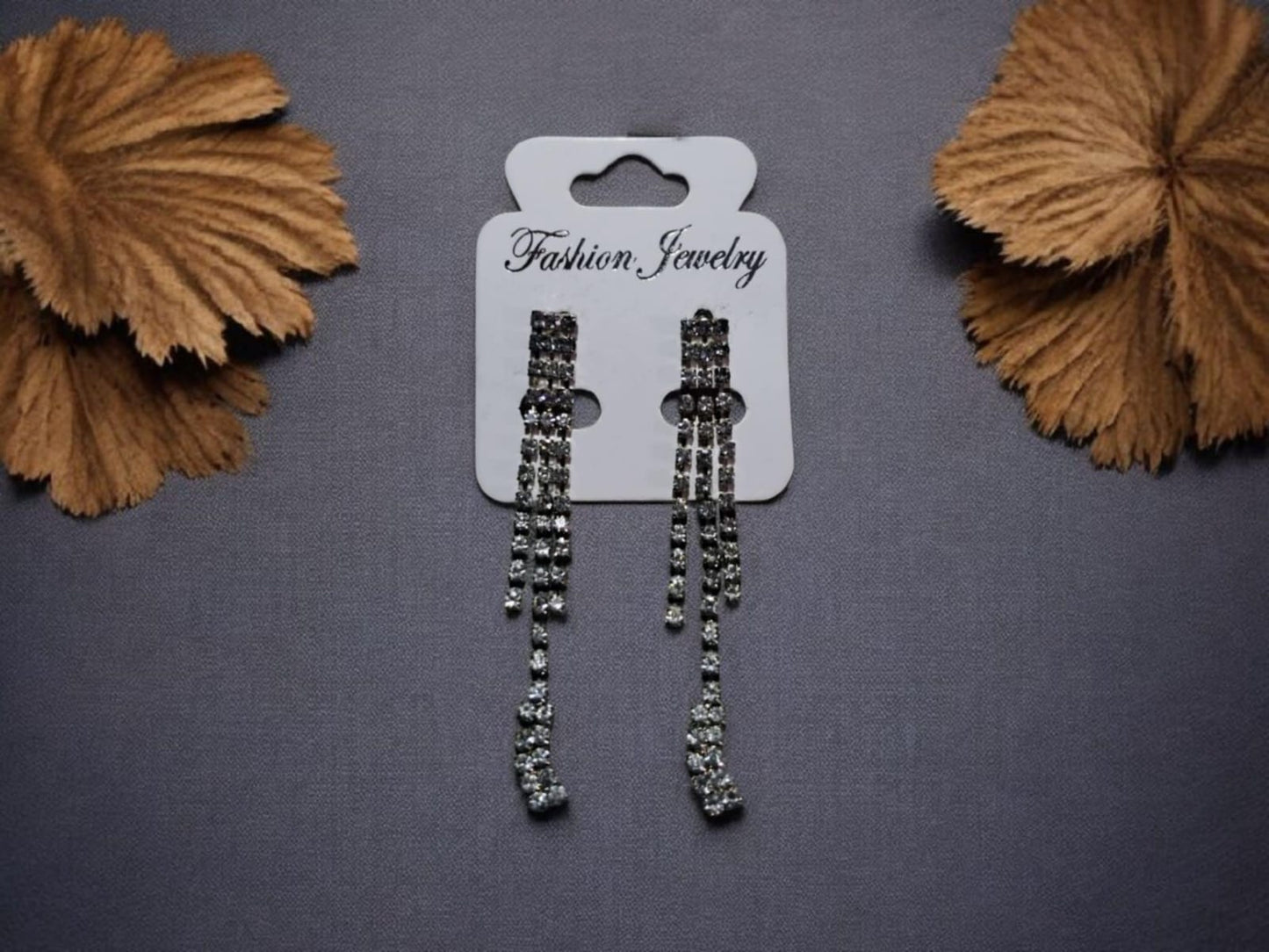 Juego par de aretes